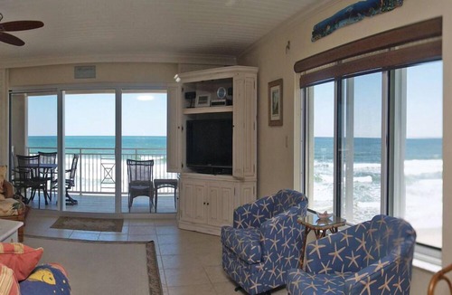 New Smyrna Beach Condo | Exclusive third floor three bedroom three bath end condo!