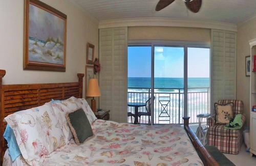 New Smyrna Beach Condo | Exclusive third floor three bedroom three bath end condo!