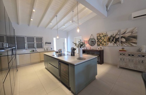 Jolly Harbour Villa | Exclusive Waterfront Home w/Panoramic Sunset Views.
