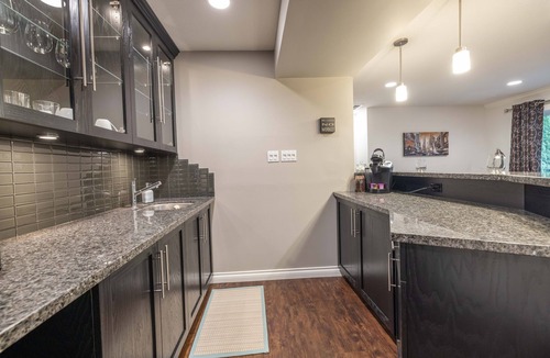 Walnut Grove House | Executive 2 bedroom suite with theater room, hot tub & large outdoor patio.