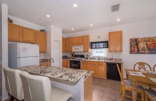 Crescent Lakes Villa | Executive 4 bed 3 bath villa, lake view, large pool, spa, 30 mins from Disney.