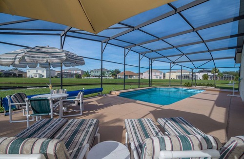 Crescent Lakes Villa | Executive 4 bed 3 bath villa, lake view, large pool, spa, 30 mins from Disney.
