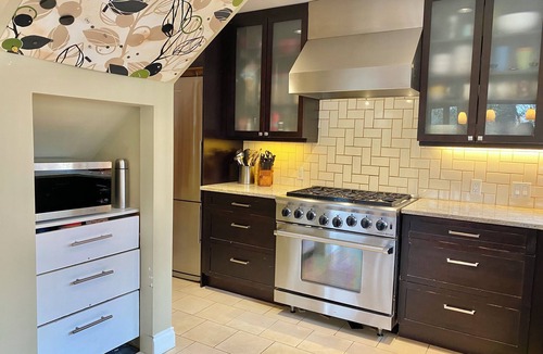 Burnaby House | Executive home on Capitol Hill at forest edge with hot tub, fire pit, backyard