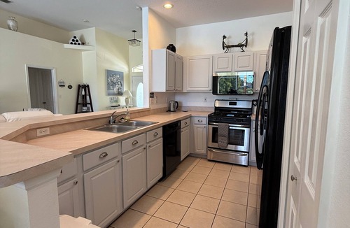 Bridgewater Crossing Villa | Executive Villa with lake views and south facing pool 4 bed 3 bath near parks
