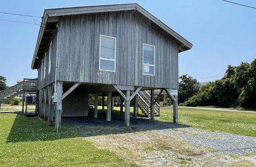 Hatteras Cottage | Exhale is Pet Friendly and close to Teach's Lair Marina and at the southern end of Hatteras Village!