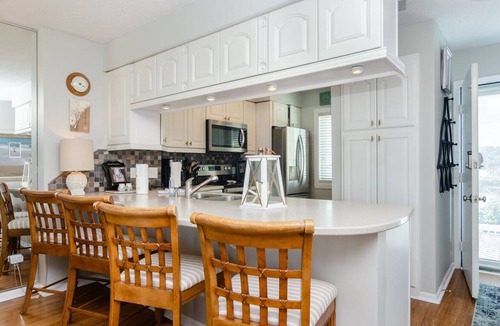 Kure Beach Condo | Expansive views from top floor Ocean Dunes condo!