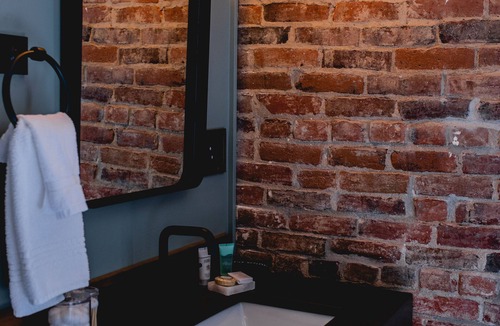 Jacksonville Hotel | Experience charming Jacksonville! This 1 BR Queen Guest Room at the Historic Inn is perfect for a wine country retreat. Walkable location, antique charm, and a comfortable Queen bed.