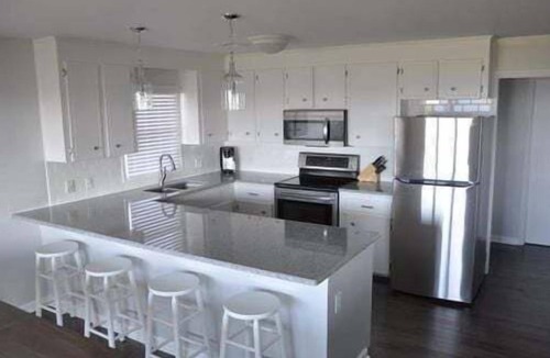 Holden Beach House | Experience coastal living at Dune Deck South, a beautiful 4-bedroom duplex in Holden Beach.