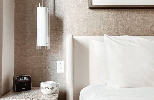 Near North Side Hotel | Experience Comfort in Eco-friendly Room w/Earth Tone Furniture