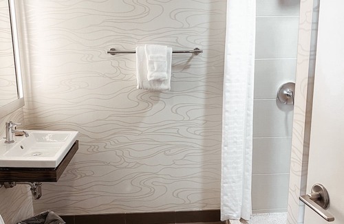 Near North Side Hotel | Experience Comfort in Eco-friendly Room w/Earth Tone Furniture
