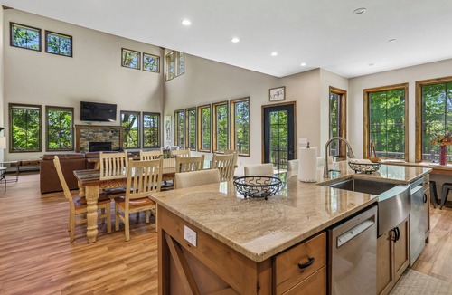 Waterfront Greens House | Experience luxury at 'Somewhere Only We Know' in Stillwater with stunning lake views!