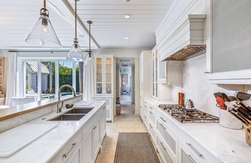 Boca Grande House | Experience luxury in this spacious 4-bedroom, 5-bathroom single-family home with a pool.