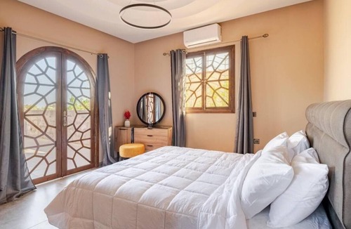 Sidi Abdallah Ghiat Villa | "Experience luxury in this beautiful Marrakech villa with a heated private