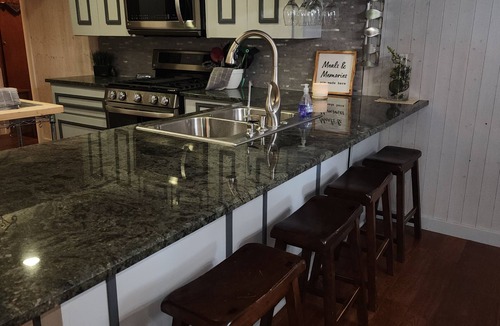 Bandera House | Experience modern comfort and Western charm at The Waller House in Bandera, the Cowboy Capital! This stylish 3-bed, 3-bath home comfortably fits 6 guests. Features a fully fenced yard, a modern kitchen, and is just a one-block walk to Main St.