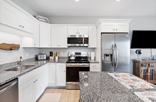 Hampton Condo | Experience modern luxury in this high-quality 1-bedroom condo.