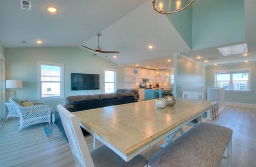 Long Beach House | Experience oceanfront bliss at Blue Yonder, a spacious 4-bedroom retreat in Oak Island.