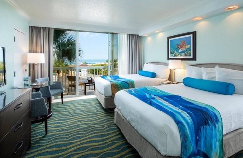 St. Pete Beach Hotel | Experience RumFish Beach: 4 Balcony Rooms Near Boca Ciega Bay & Dali Museum