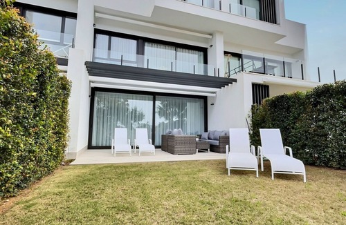 San Roque House | Experience sophistication in this contemporary four-bedroom frontline golf townhouse