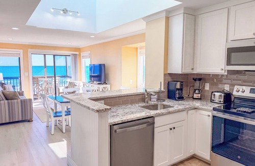 Ocean Drive Condo | Experience Tilghman Beach and Racquet Club Unit 301! Oceanfront, Pools, Tennis, Close to Main Street!
