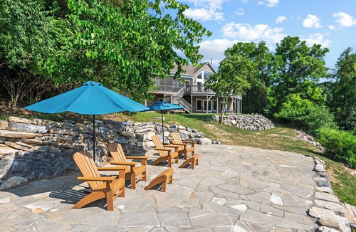 Dublin House | Experience the perfect blend of rustic charm and modern luxury in this Claytor lakefront retreat