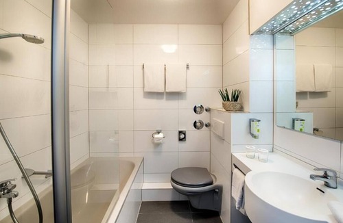Hockenheim Hotel | Experience Tranquility in an Inviting Room | Free Parking & Pets Allowed