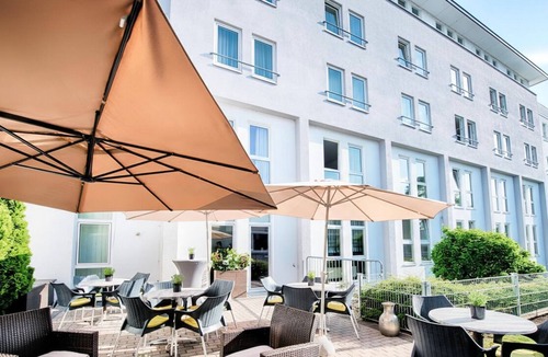 Hockenheim Hotel | Experience Tranquility in an Inviting Room | Free Parking & Pets Allowed