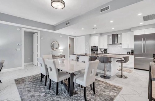 Redevelopment Area Condo | Experience true luxury with this chic and modern condo in Naples.