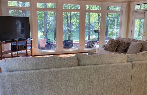 Oxford House | "Experience Waterfront Bliss: Complete with a Private Stocked Lake!"nn