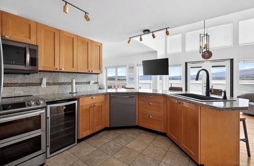 Westbank Condo | Experience West Kelowna’s heart! Minutes from Mission Hill & the Wine Trail. Whether you’re here for boating, golf, or a spa retreat, "Serenity Shore" is your perfect lakeside home base for exploring the best of the Okanagan.