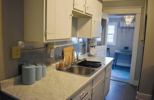 Huntington Apartment | Exposed Brick by Uni,Arena,Hosp+Towel Warmer,Robes