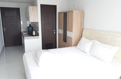 Cibaduyut Hotel | EXPRESS O 91863 Mekarwangi M-square Apartment By Santosa Property