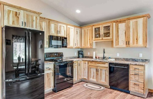 Conover House | Exquisite dog-friendly cabins with hot tub, fireplace, patio, grill, central AC, & W/D