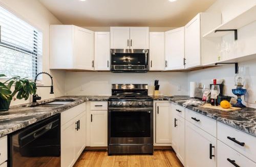 Sweetbriar House | Extended Stay SoCo Oasis with Outdoor TV & Heavenly Bed