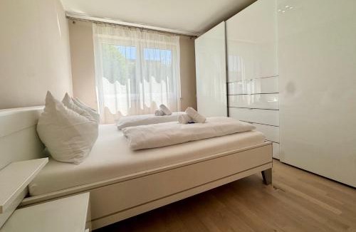 Latschach Apartment | FAAKER SEE HIDEAWAY - Apartment mit Garten