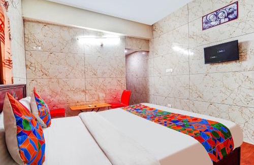 Gandhipuram Hotel | FabExpress Apple Grand - 200m from Our Lady of Fatima Church