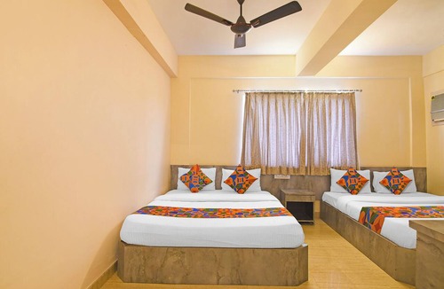 New Town Hotel | FabHotel The Bliss, Nr - Bisarjan Ghat