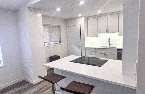 Northwest Calgary House | Fabulous 4-bedroom, two-bath home close to Downtown, the mountains and Banff