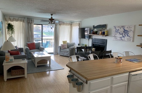 Village of Four Seasons Condo | Fabulous Waterfront Condo with Boatslip!