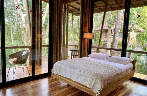 Jaco Cabin | Fairytale ceiling glass bamboo structure with jungle view