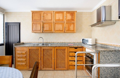Caleta de Famara Apartment | Famara Beach Apartment on the Shore with Shared Pool, Terrace, Ocean/Mountain Views & Wi-Fi