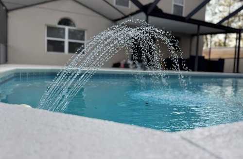 Spring Hill House | Family-Friendly 4BR Oasis Private Heated Pool & Game Room