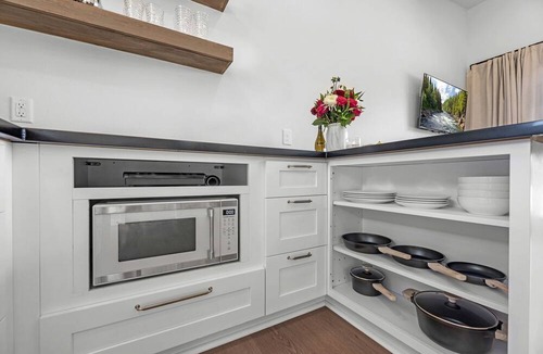 Waller Cabin | Family-Friendly Tiny Home Resort with Pool, Goats & Pond in Hempstead near Houston