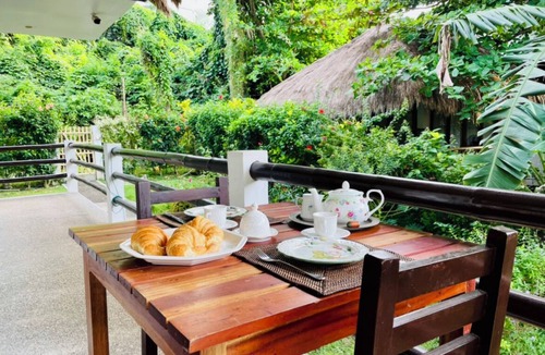 Balabag Apartment | Family Studio with panoramic windows to tropical greenery. 3 min to the beach