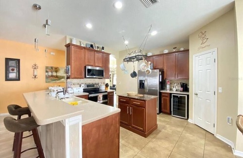 Gibsonton House | Feel like at home with big outdoor space for BBQs and Hot tub. Centrally located