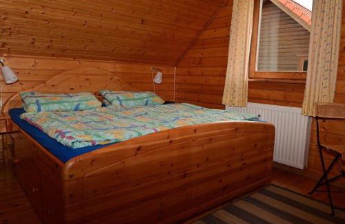 Rotacker House | Ferienhaus im Holzblockstil im Naturerlebnisdorf Blauvogel