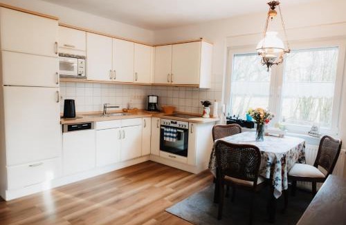 Egels House | Ferienhaus Warf mit Wintergarten Kamin und Teich