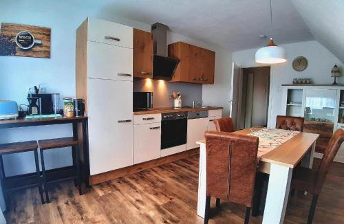 Friedensdorf Apartment | Ferienwohnung Brälu