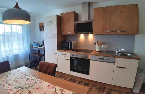 Friedensdorf Apartment | Ferienwohnung Brälu
