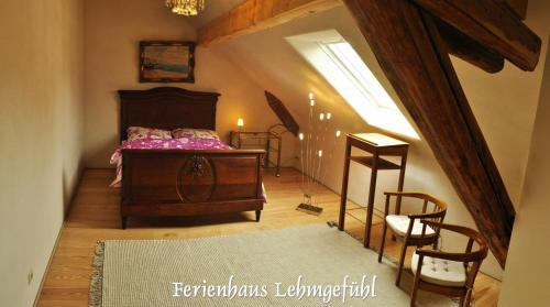 Pfalzel House | Ferienwohnung Haus Lehmgefühl