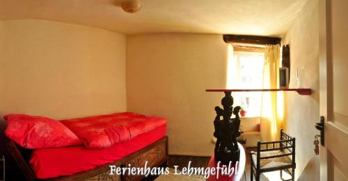 Pfalzel House | Ferienwohnung Haus Lehmgefühl